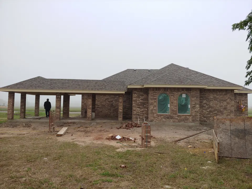 Brick rear elevation with deep covered patio
