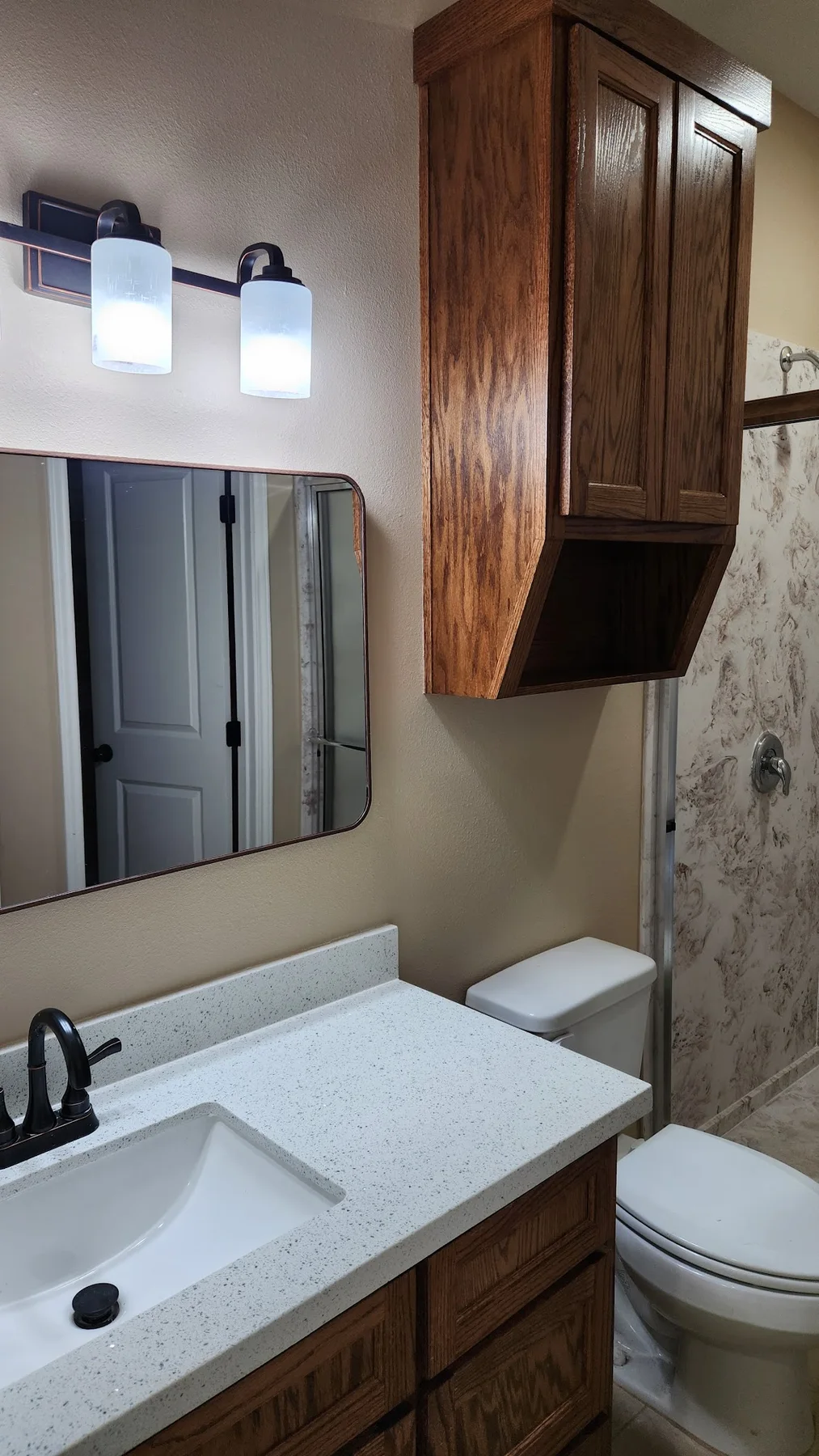 Finished bathroom at 1100 Lucero Street in Alice, Texas